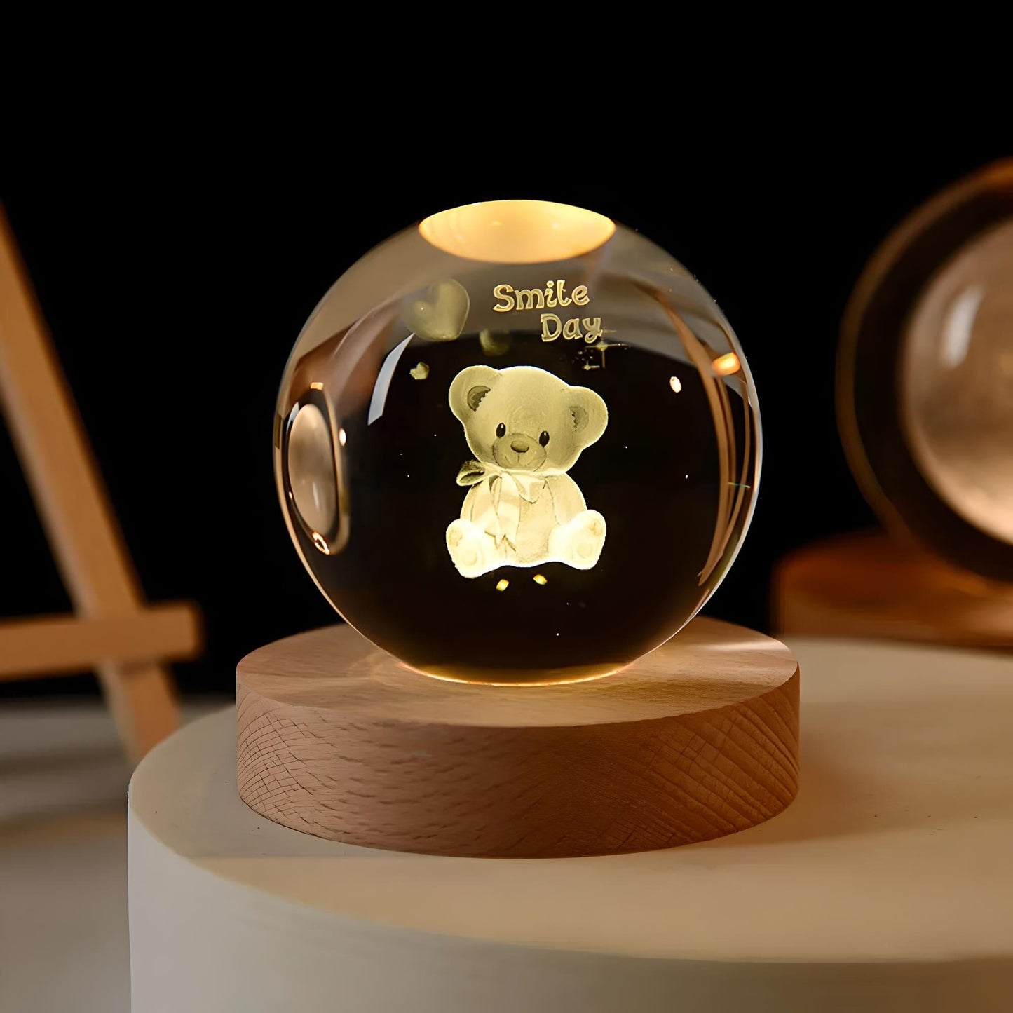 Veilleuse boule de cristal ourson