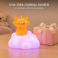 Veilleuse renard sur nuage lumineux à côté d'un paquet cadeau, une idée cadeau tendre pour un enfant